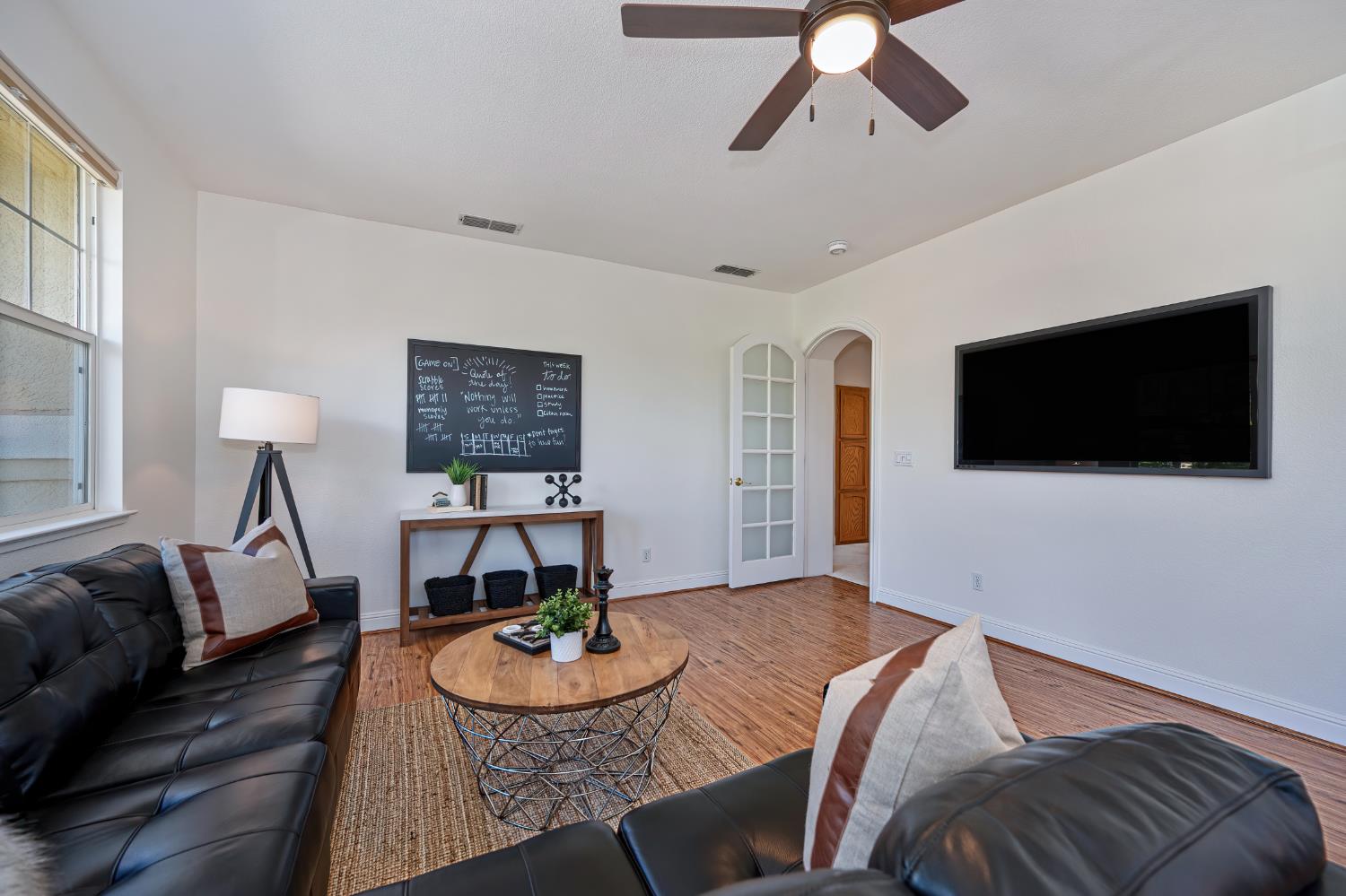 820 Travis Street Folsom, CA 95630 - Photo 40 of 47 a living room with furniture and a flat screen tv
