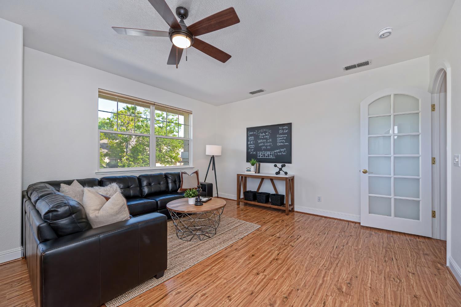 820 Travis Street Folsom, CA 95630 - Photo 41 of 47 a living room with furniture and a window