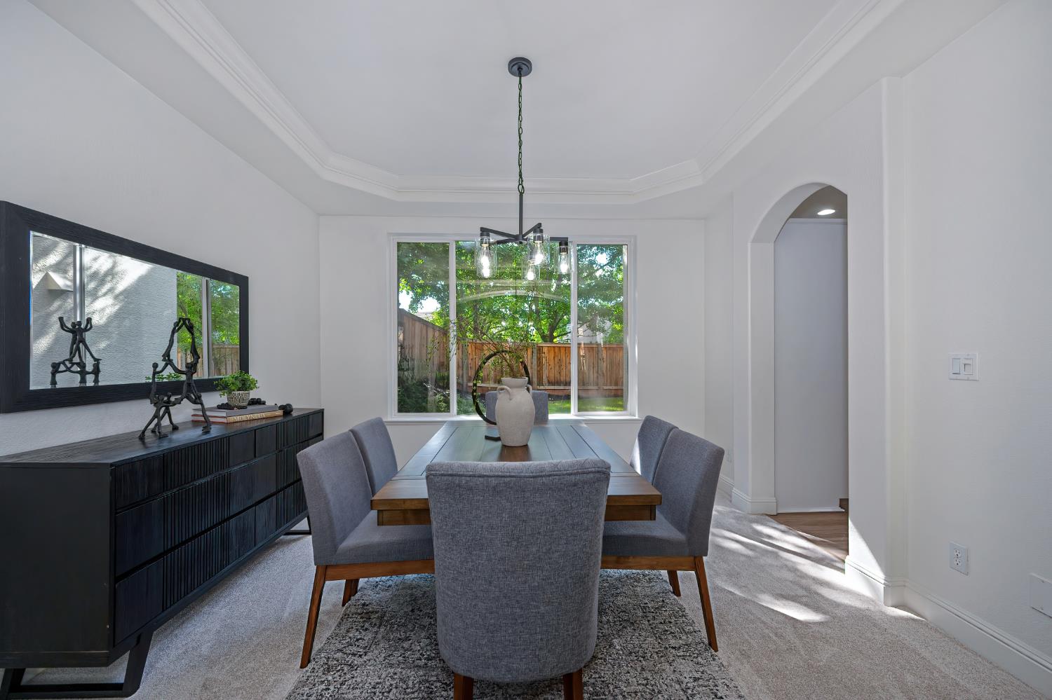 820 Travis Street Folsom, CA 95630 - Photo 10 of 47 a dining room with furniture a chandelier and window