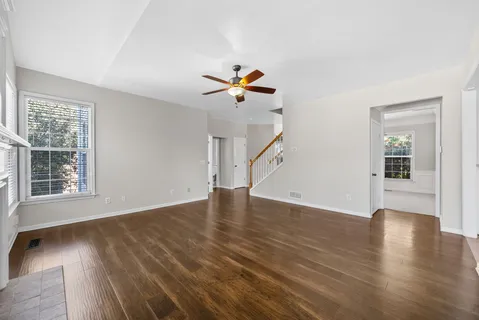 a large kitchen with kitchen island granite countertop a large counter top and stainless steel appliances
