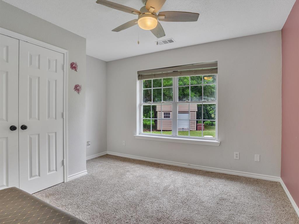 15067 Meadow Ridge Court Nevada, TX 75173 - Photo 17 of 39 a view of an empty room with a window