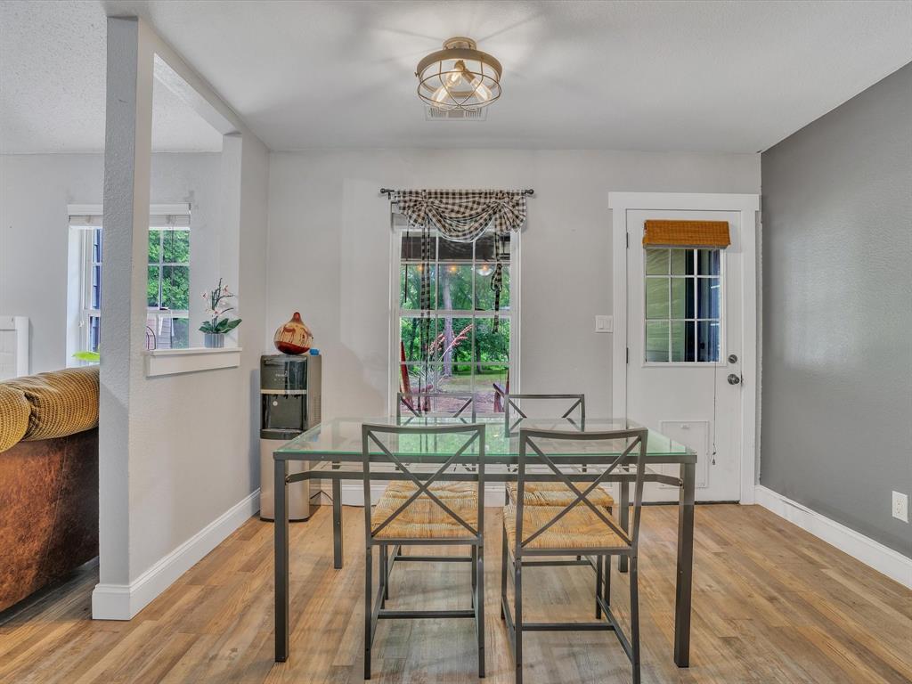 15067 Meadow Ridge Court Nevada, TX 75173 - Photo 19 of 39 a dining room with furniture and window