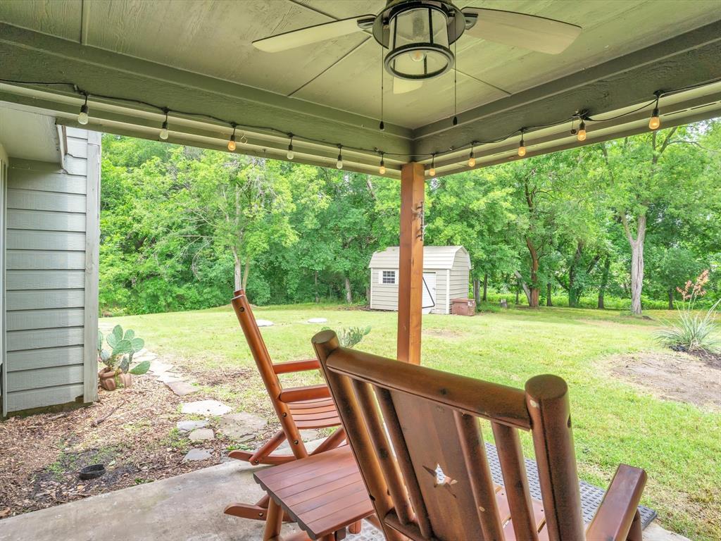 15067 Meadow Ridge Court Nevada, TX 75173 - Photo 33 of 39 a view of a porch with furniture and garden