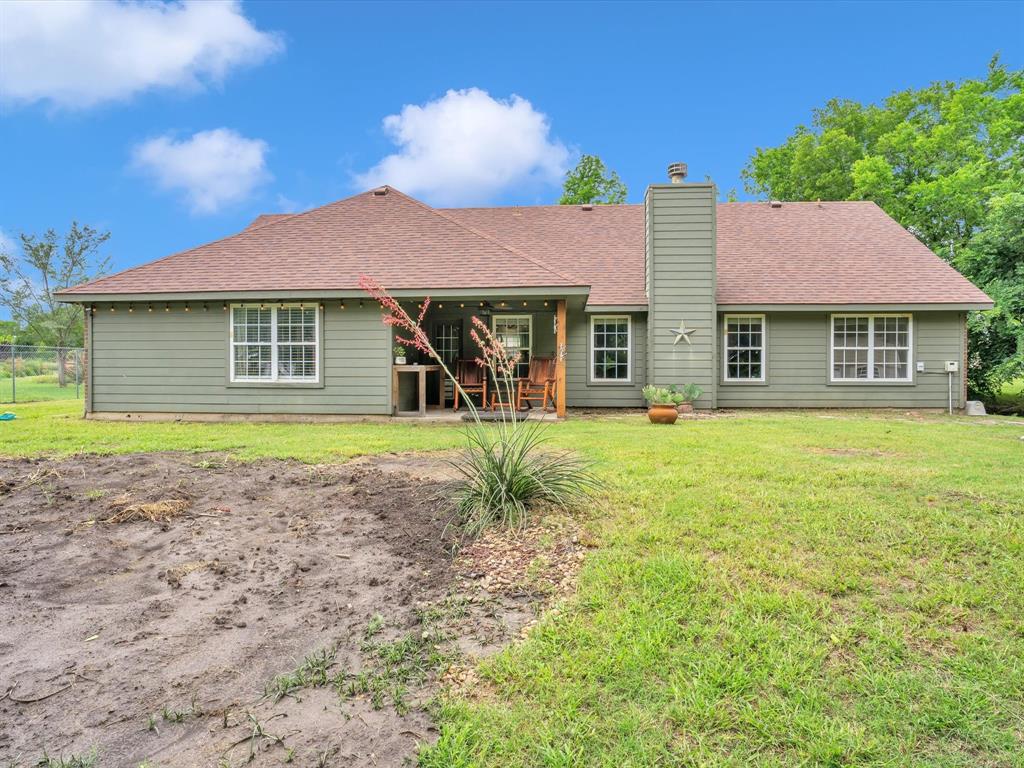 15067 Meadow Ridge Court Nevada, TX 75173 - Photo 35 of 39 a house view with a garden space