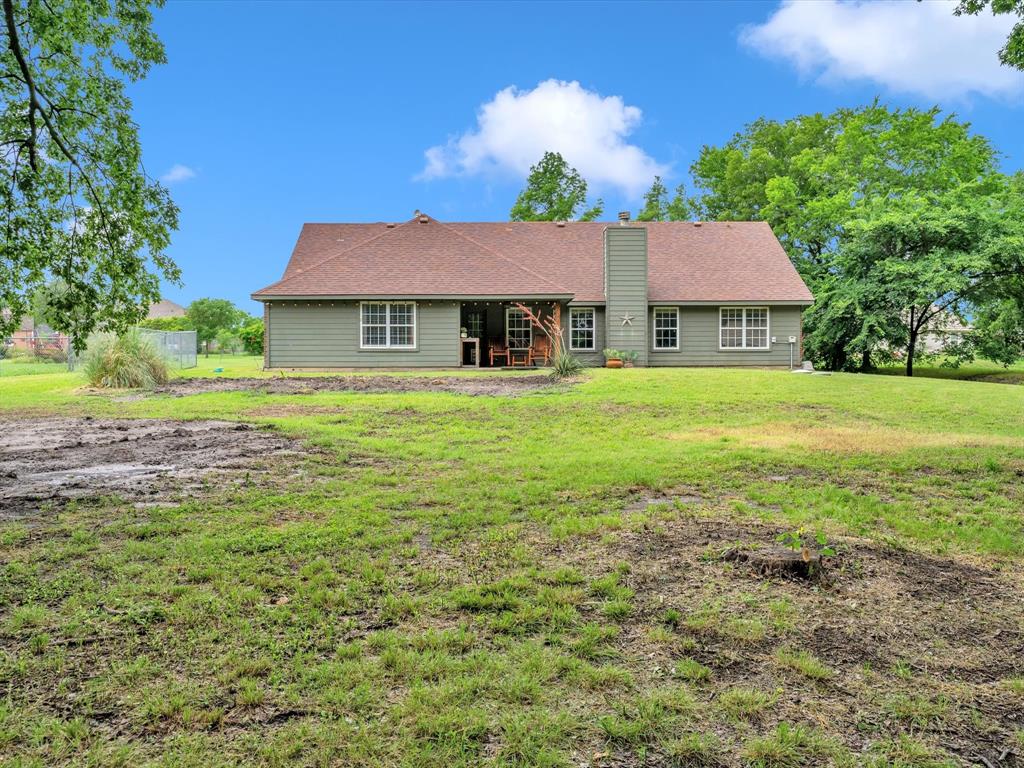 15067 Meadow Ridge Court Nevada, TX 75173 - Photo 37 of 39 a house view with a garden space