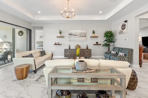 an aerial view of a house with swimming pool and outdoor space