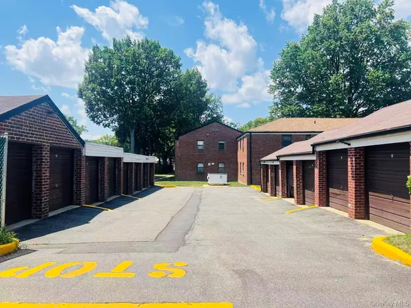 a view of a cafe with sitting area
