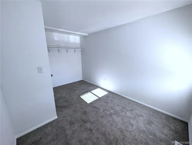 an empty room with an empty space