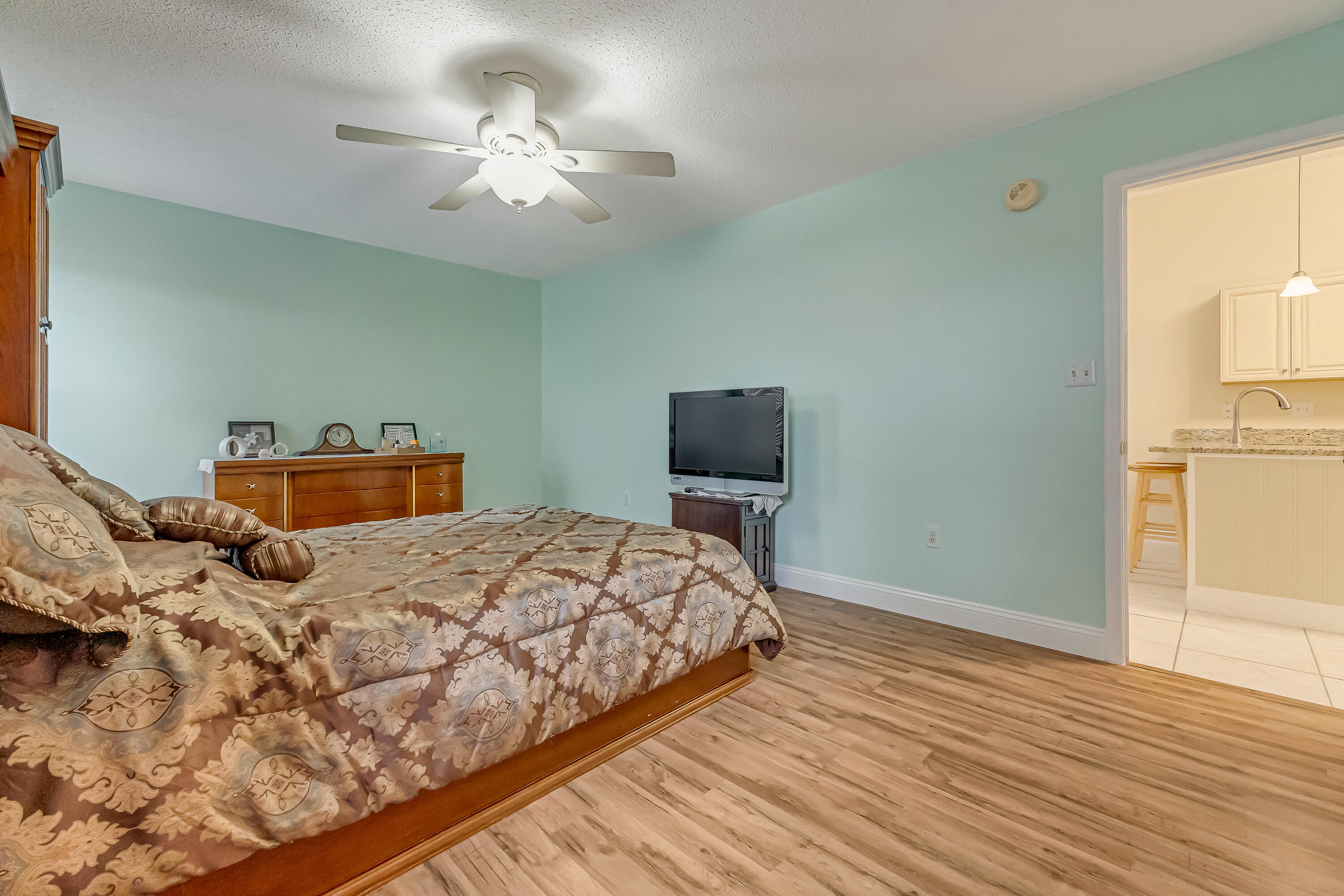 4730 Connor Drive Crestview, FL 32539 - Photo 32 of 71 a bedroom with a bed and a tv