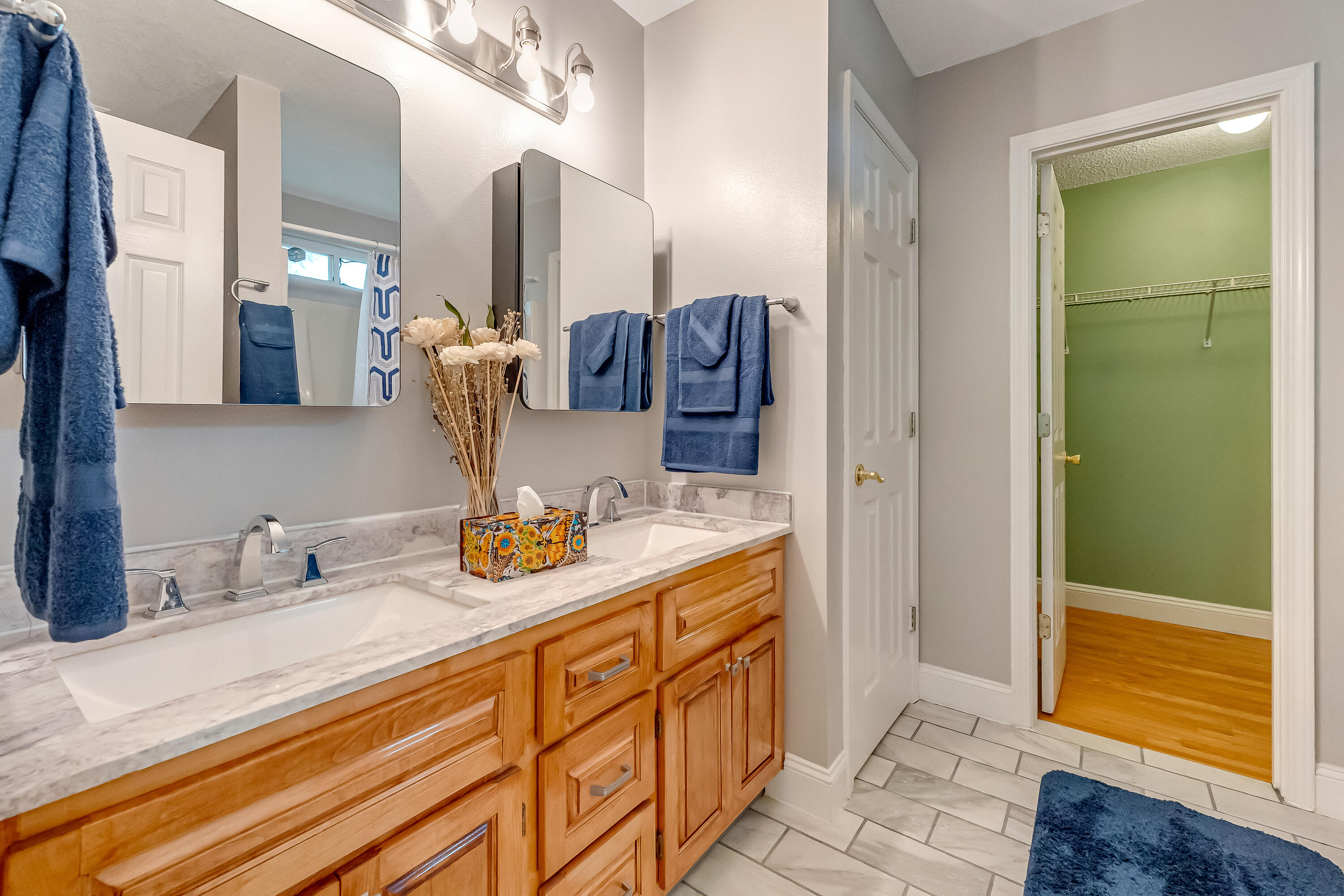 4730 Connor Drive Crestview, FL 32539 - Photo 36 of 71 a bathroom with a granite countertop sink and a mirror