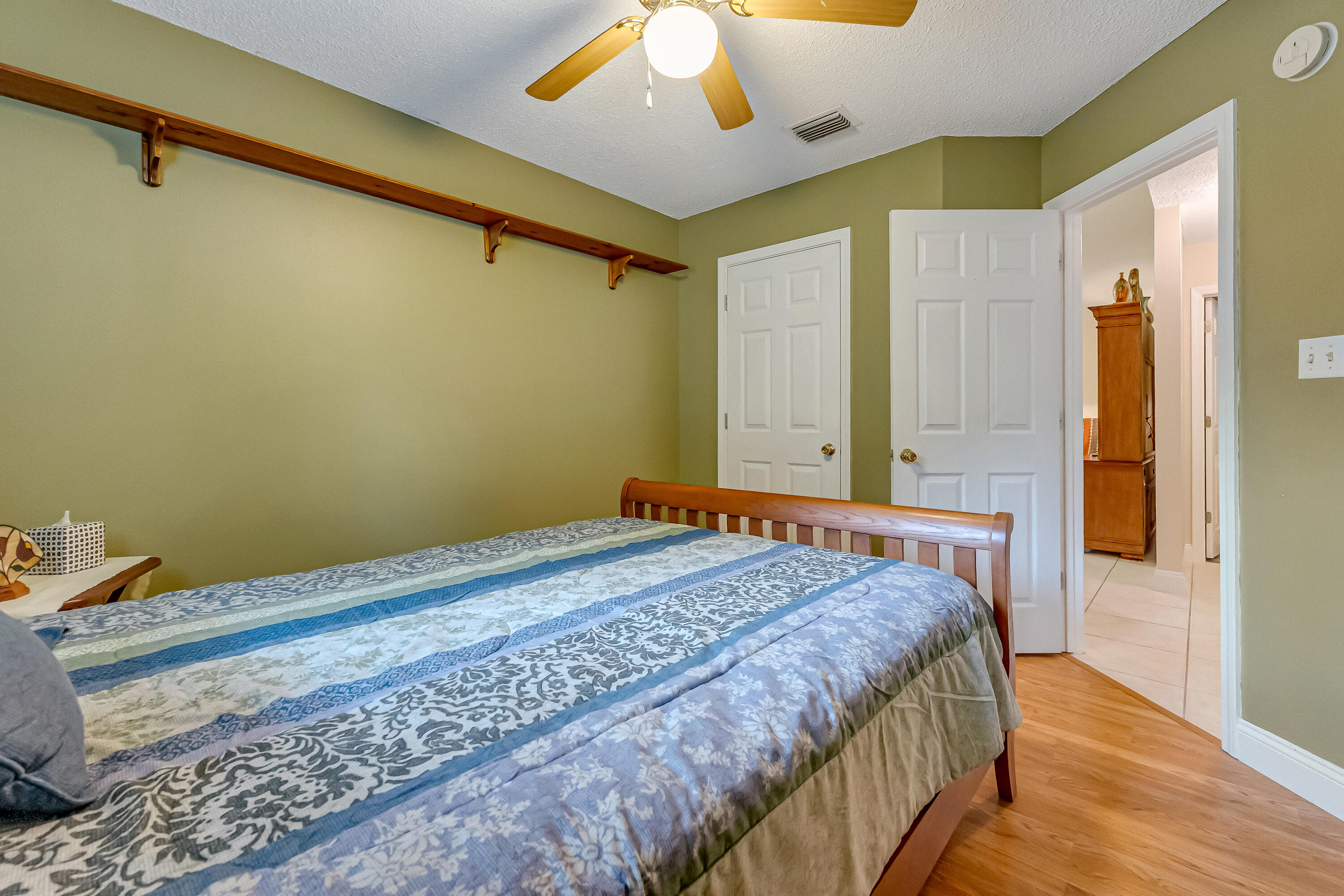 4730 Connor Drive Crestview, FL 32539 - Photo 40 of 71 a bedroom with a bed and a window