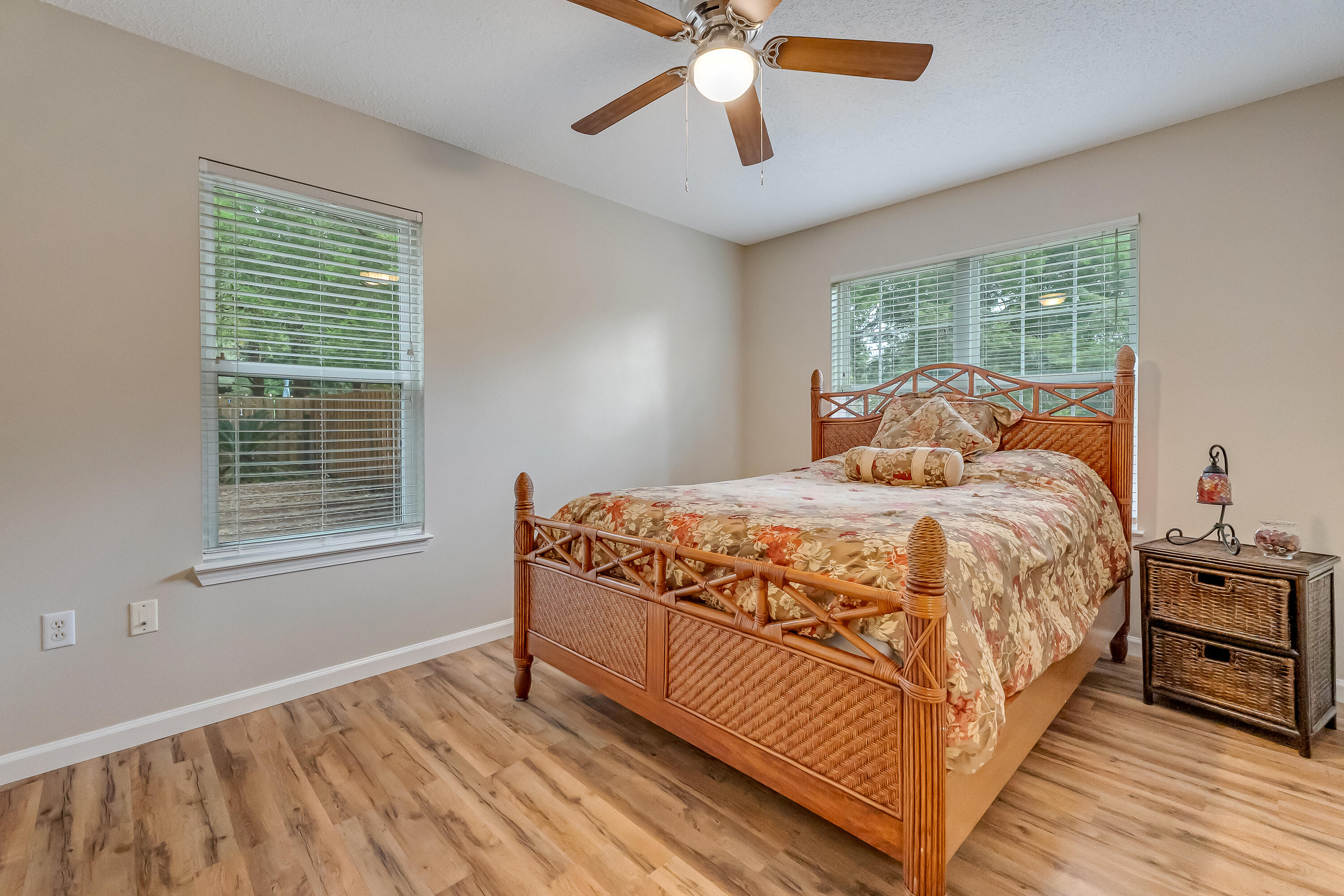 4730 Connor Drive Crestview, FL 32539 - Photo 41 of 71 a bedroom with a bed and a large window