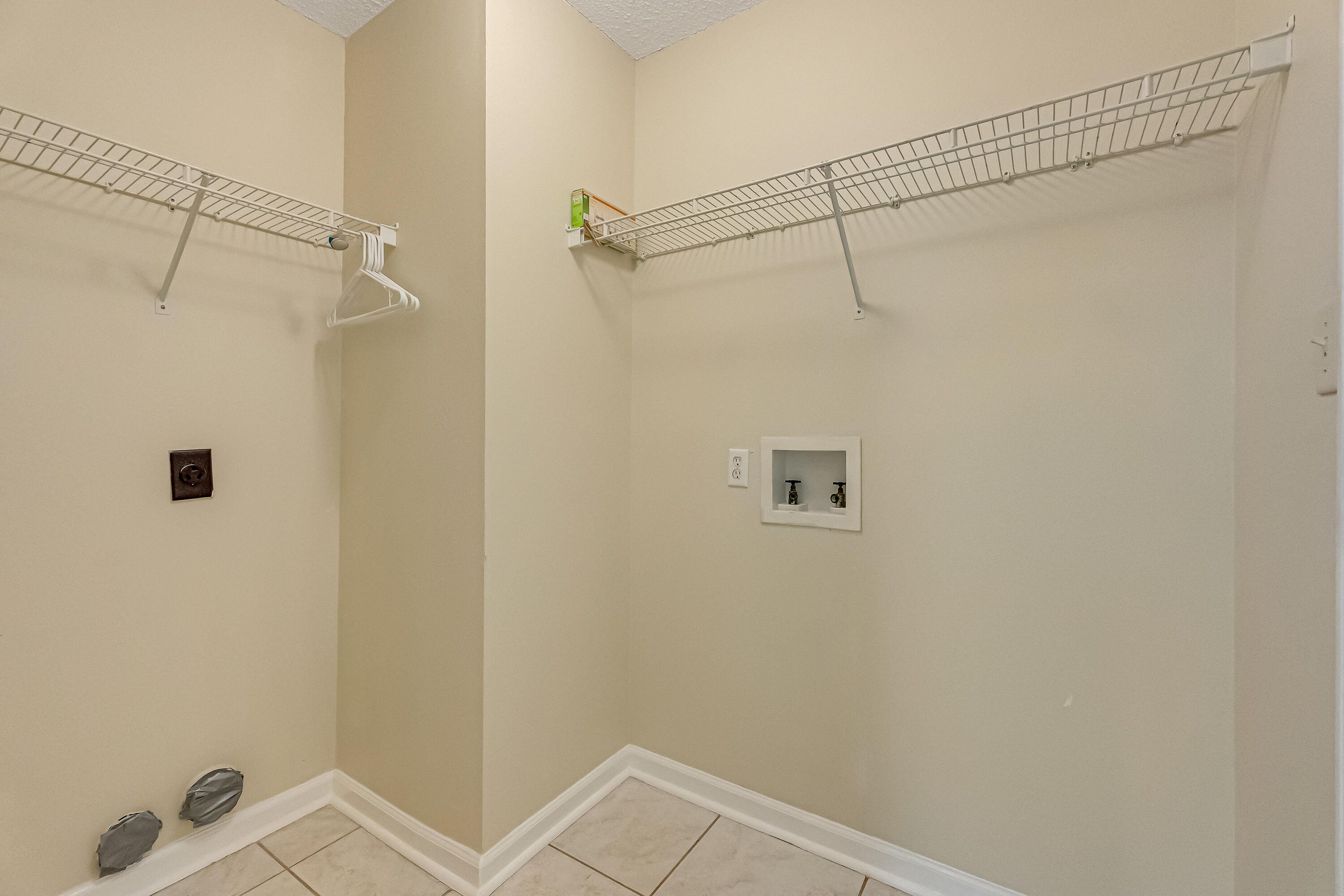 4730 Connor Drive Crestview, FL 32539 - Photo 49 of 71 a bathroom with a shower and cabinets