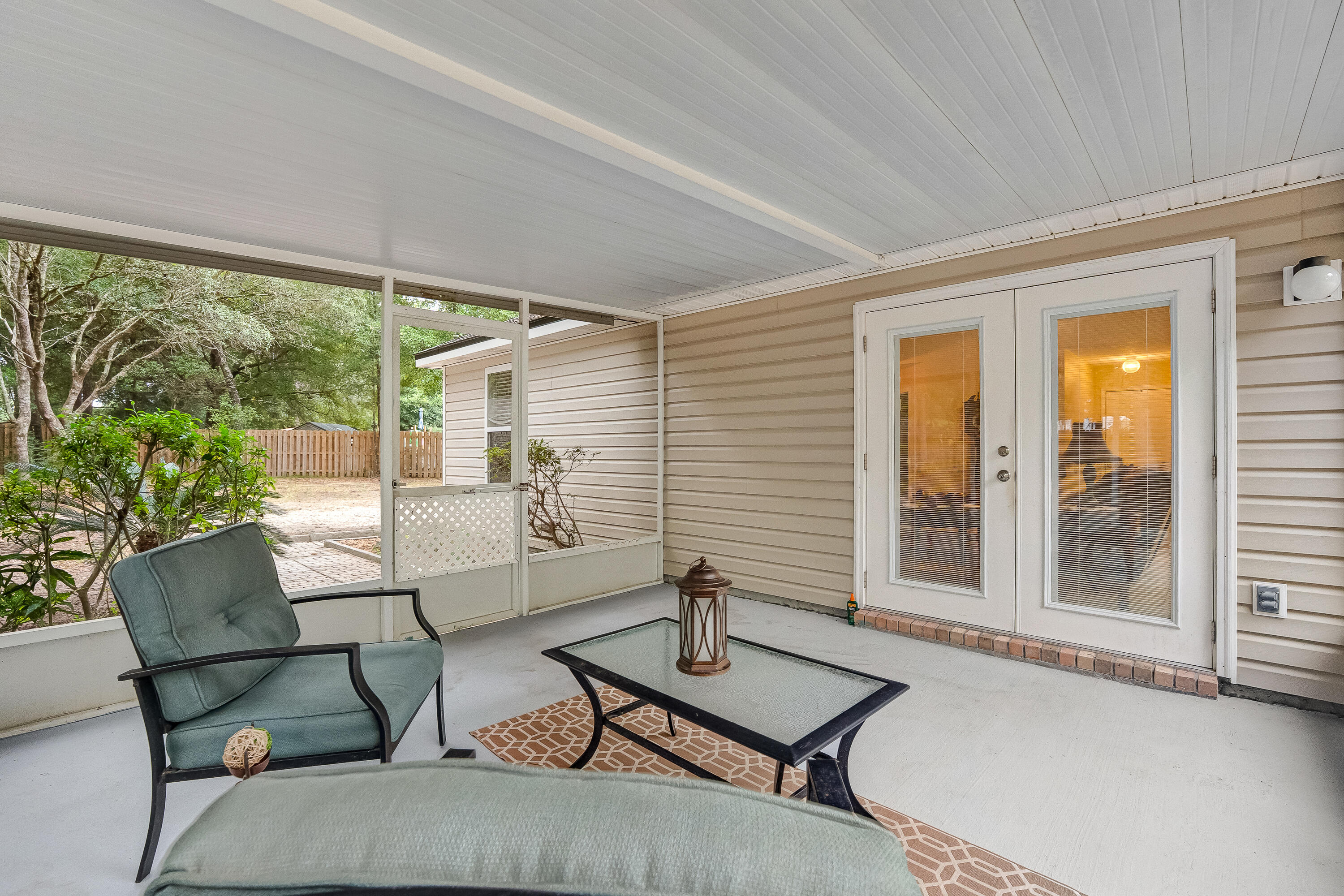 4730 Connor Drive Crestview, FL 32539 - Photo 55 of 71 a living room with furniture and a window