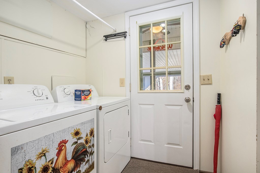 2226 Layson Road Hiawassee, GA 30546 - Photo 17 of 38 a utility room with a refrigerator and washer