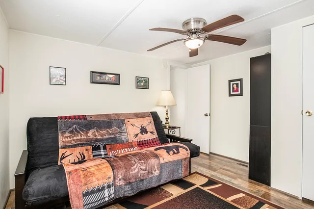 a bed room with a bed and a couch