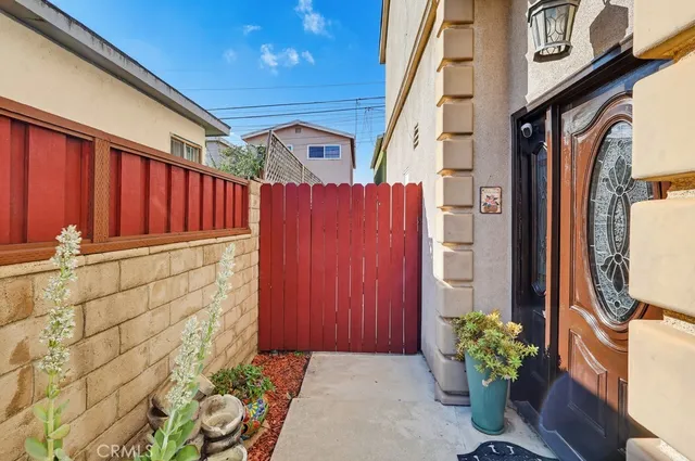 a view of a door and chair in the patio