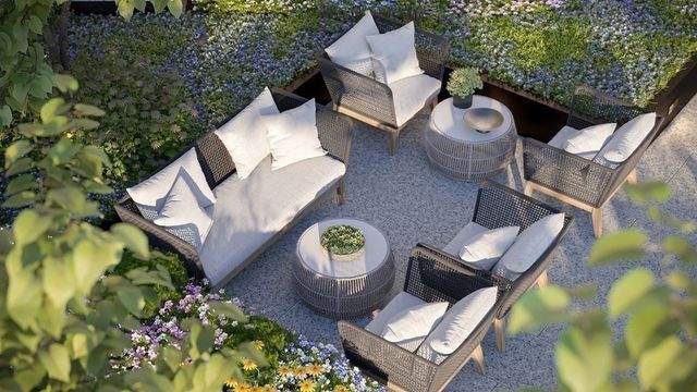 a view of a chairs and table in a backyard