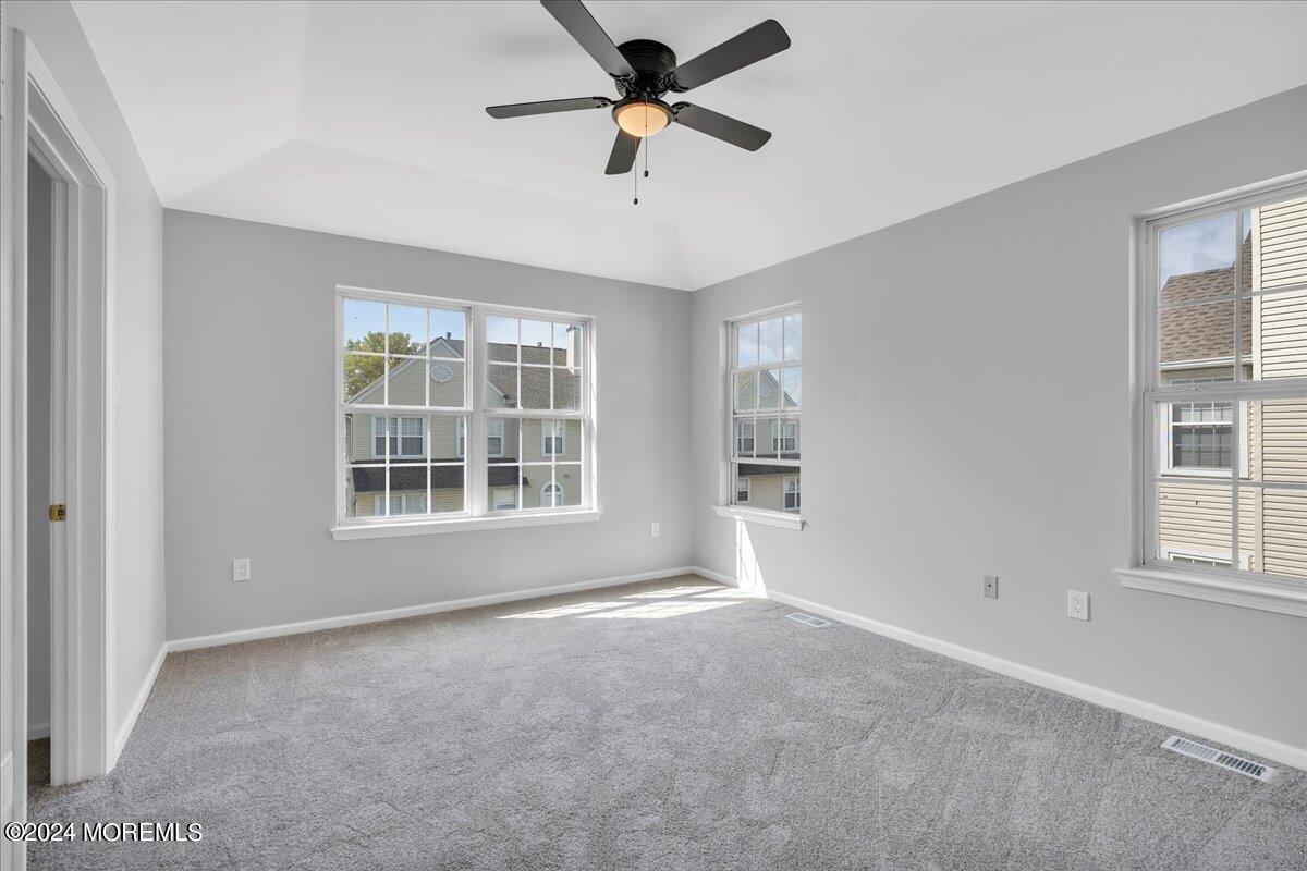 7701 Juniper Lane Palmyra, NJ 08065 - Photo 21 of 31 a view of a livingroom with a ceiling fan and window