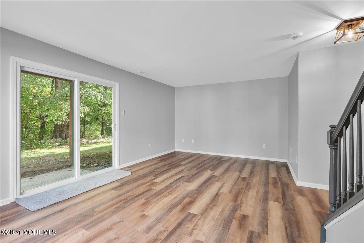 7701 Juniper Lane Palmyra, NJ 08065 - Photo 23 of 31 a view of empty room with wooden floor and fan