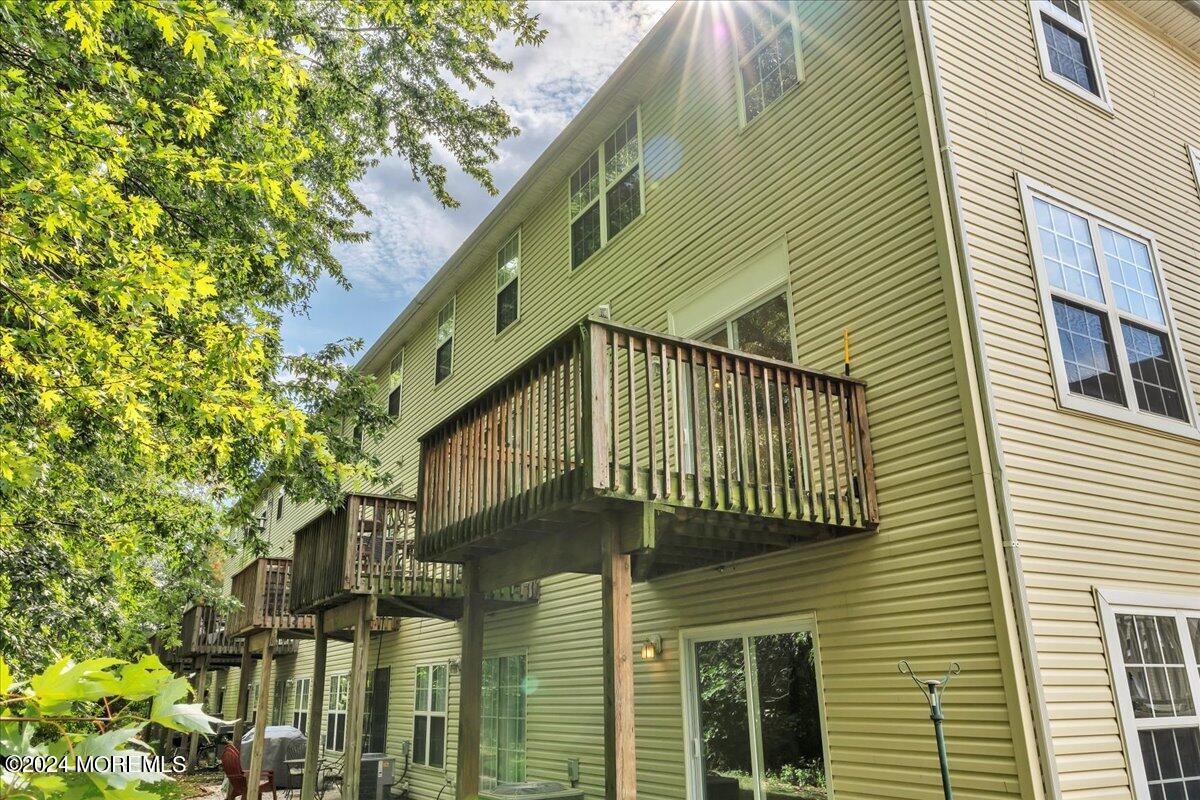 7701 Juniper Lane Palmyra, NJ 08065 - Photo 27 of 31 a front view of a house with a garden