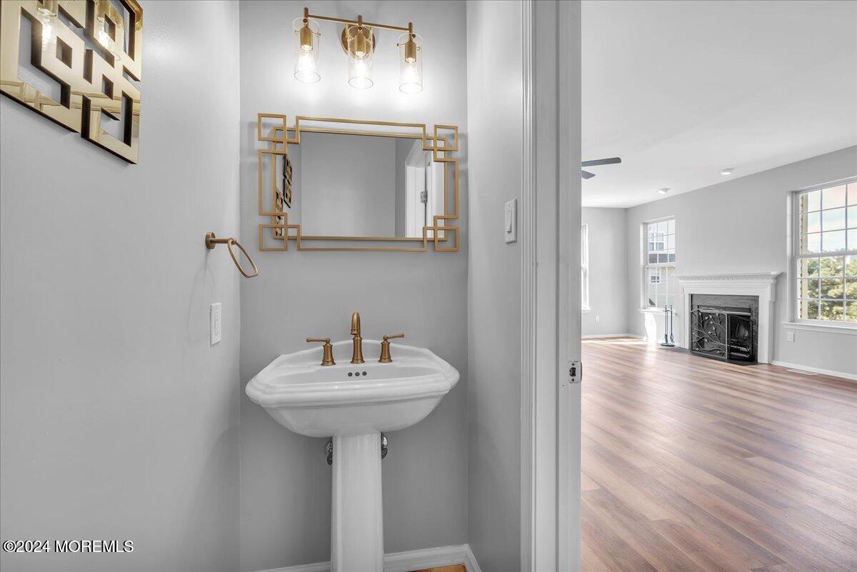 7701 Juniper Lane Palmyra, NJ 08065 - Photo 7 of 31 a bathroom with a sink and a mirror