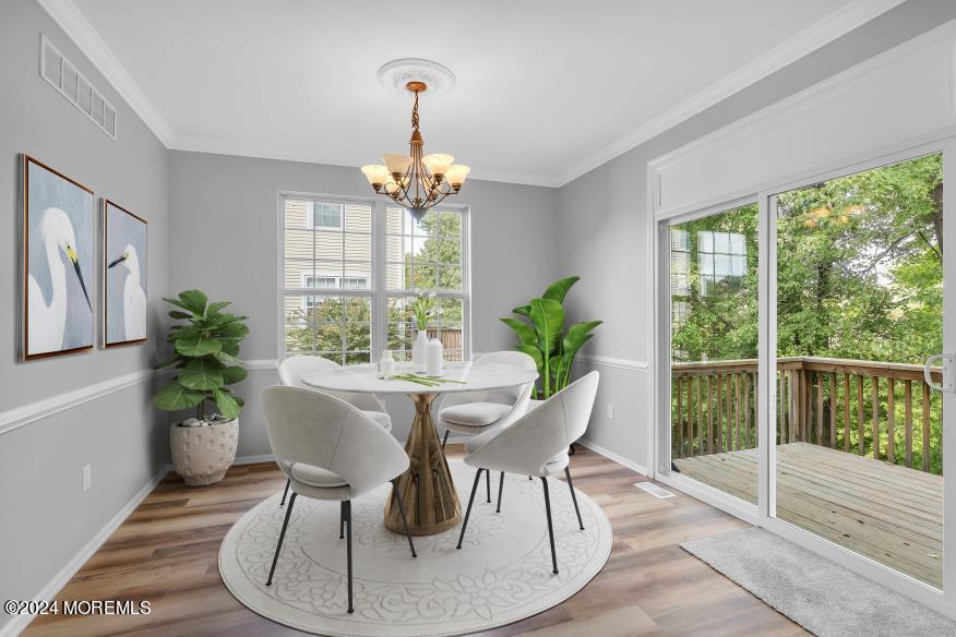 7701 Juniper Lane Palmyra, NJ 08065 - Photo 9 of 31 a view of a dining room with furniture window and wooden floor