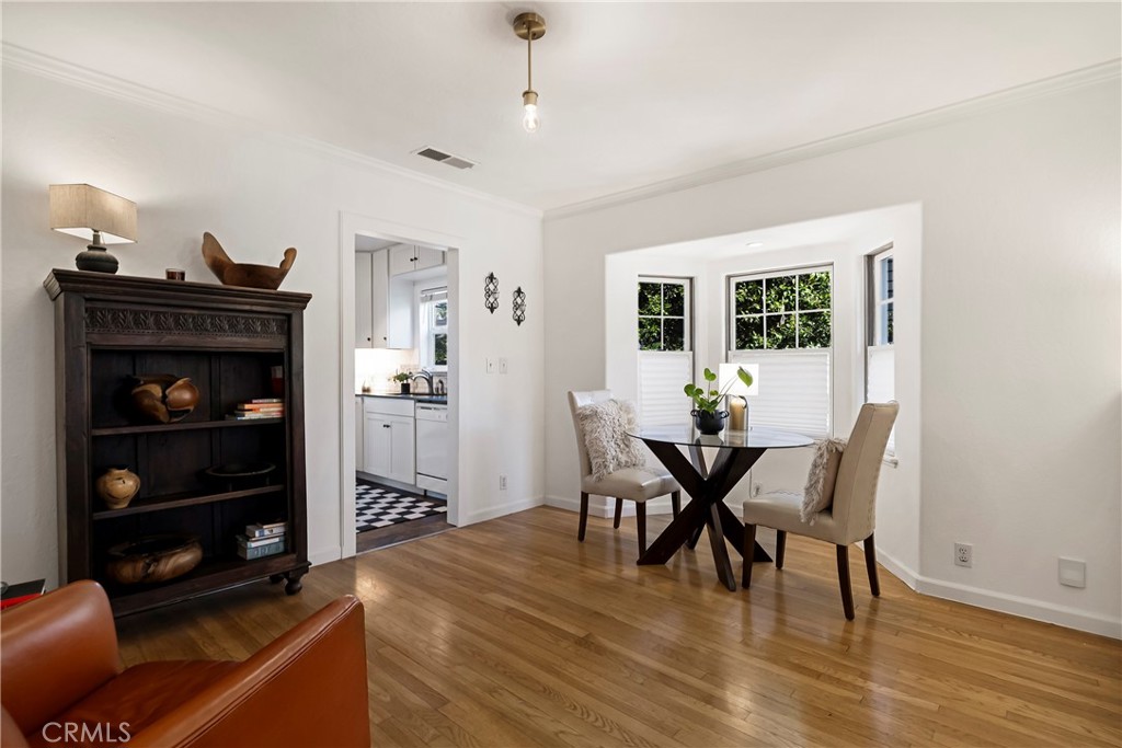234 West 3rd Avenue Chico, CA 95926 - Photo 12 of 54 a view of a dining room with furniture and wooden floor