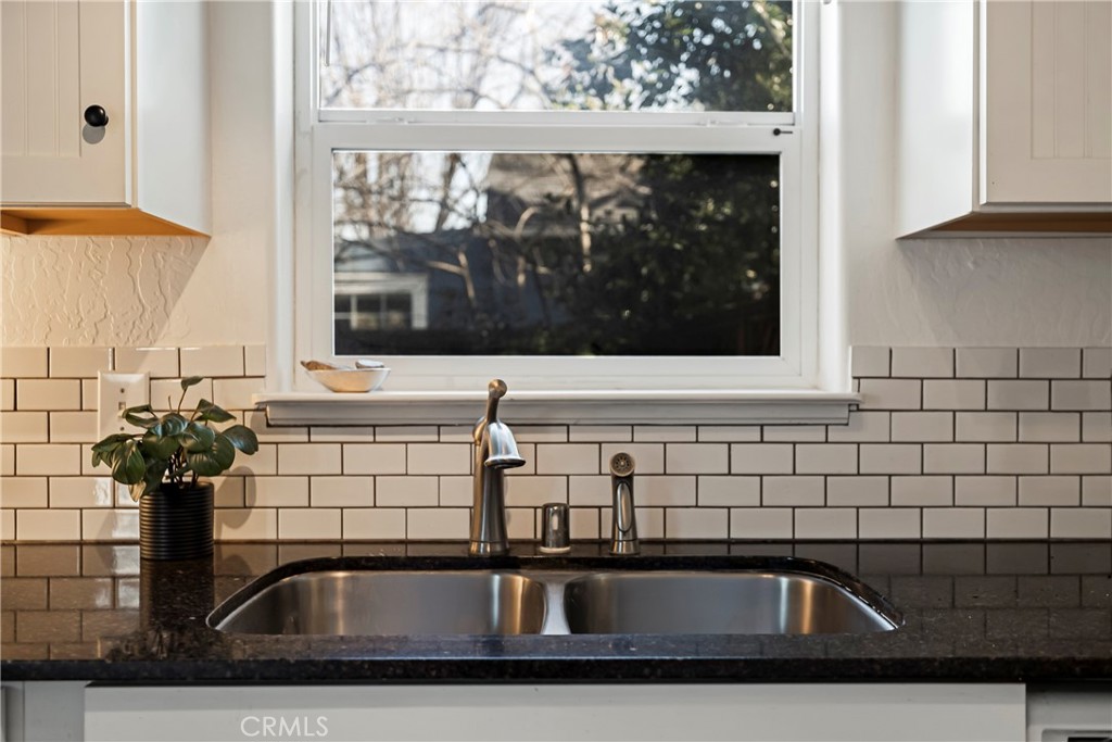 234 West 3rd Avenue Chico, CA 95926 - Photo 17 of 54 a bathroom with a sink and a mirror