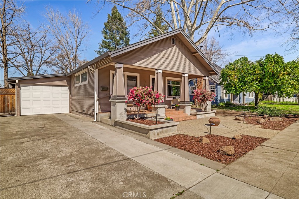 234 West 3rd Avenue Chico, CA 95926 - Photo 2 of 54 a front view of house with yard outdoor seating and covered with trees
