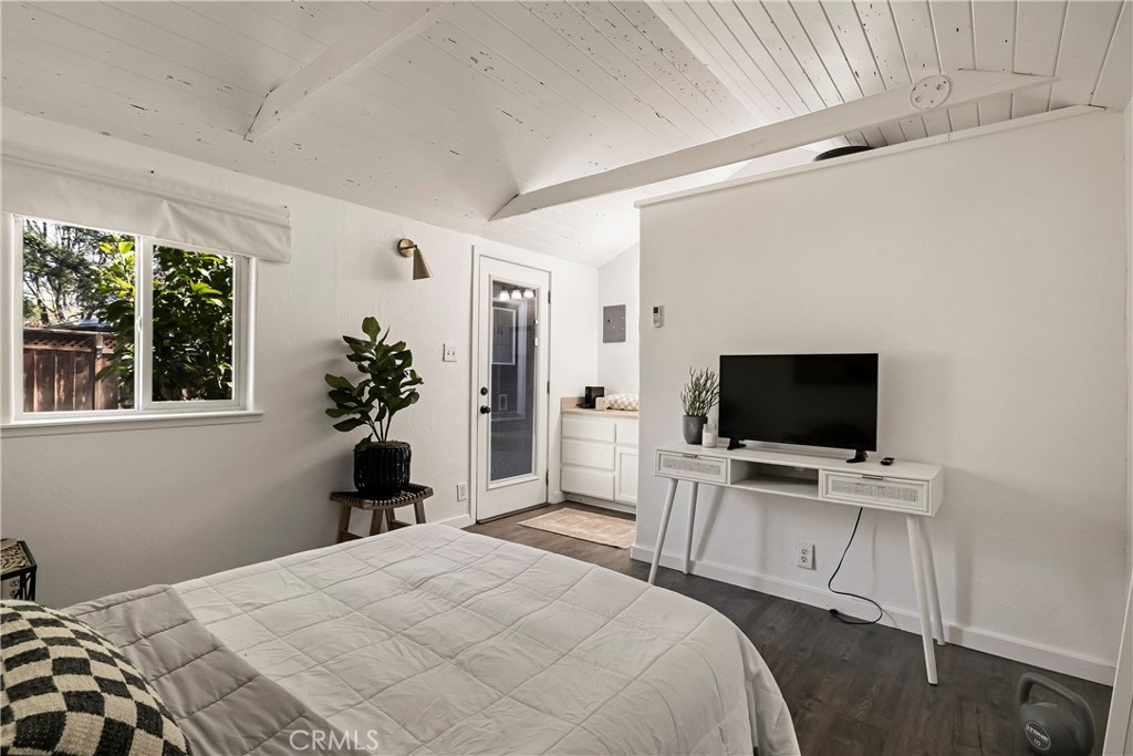 234 West 3rd Avenue Chico, CA 95926 - Photo 21 of 54 a bedroom with a bed and a flat screen tv