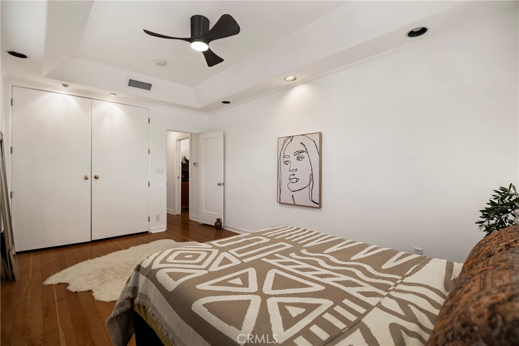 234 West 3rd Avenue Chico, CA 95926 - Photo 26 of 54 a bedroom with a bed and a chandelier