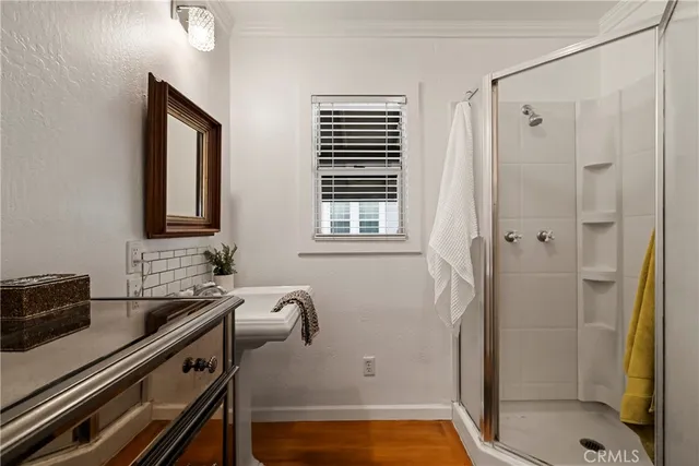 a bathroom with a sink and a shower