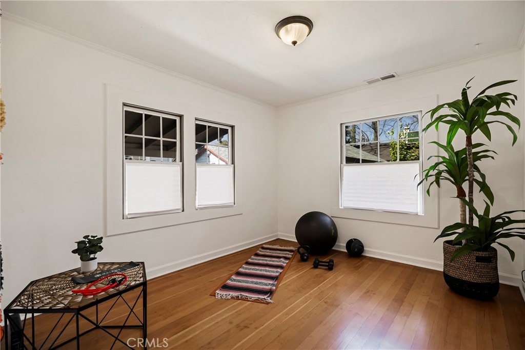 234 West 3rd Avenue Chico, CA 95926 - Photo 32 of 54 a view of a workspace with furniture and gym equipment