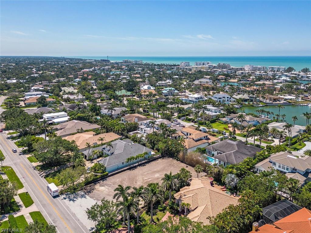 2331 Crayton Road Naples, FL 34103 - Photo 2 of 10 an aerial view of a city