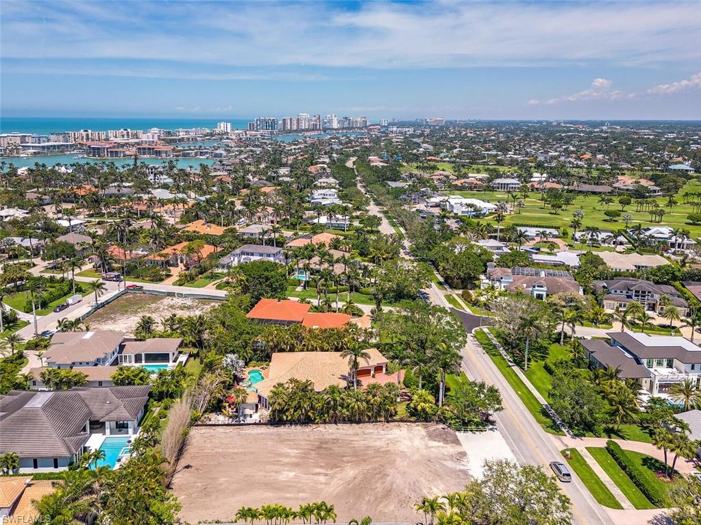 2331 Crayton Road Naples, FL 34103 - Photo 4 of 10 an aerial view of residential houses with city view