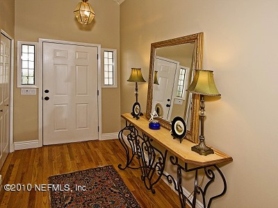 49 Solana Road Ponte Vedra Beach, FL 32082 - Photo 3 of 16 a view of an entryway with wooden floor