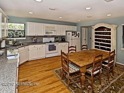 49 Solana Road Ponte Vedra Beach, FL 32082 - Photo 6 of 16 a kitchen with a table and chairs in it