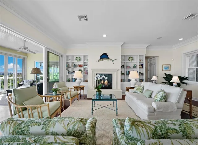 a dining room with furniture wooden floor and a rug