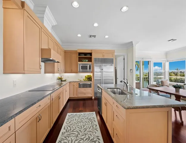 a bedroom with a bed and a desk