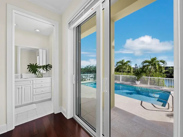 a view of a living room and floor to ceiling window