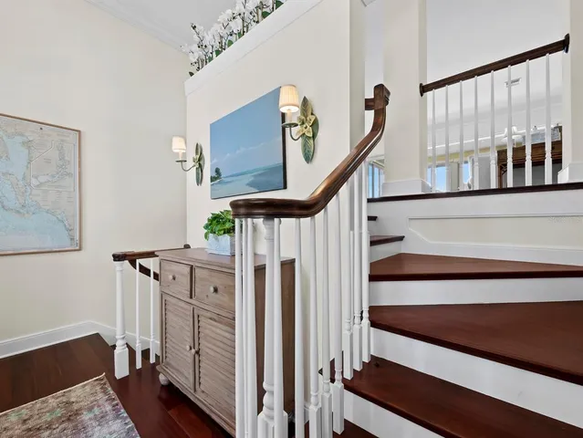 a living room with furniture potted plant and a fireplace
