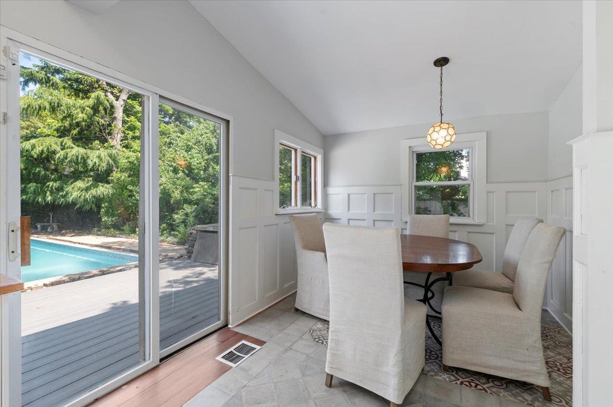 56 West Donellan Road Hampton Bays, NY 11946 - Photo 13 of 27 a view of a dining room and furniture window and wooden floor