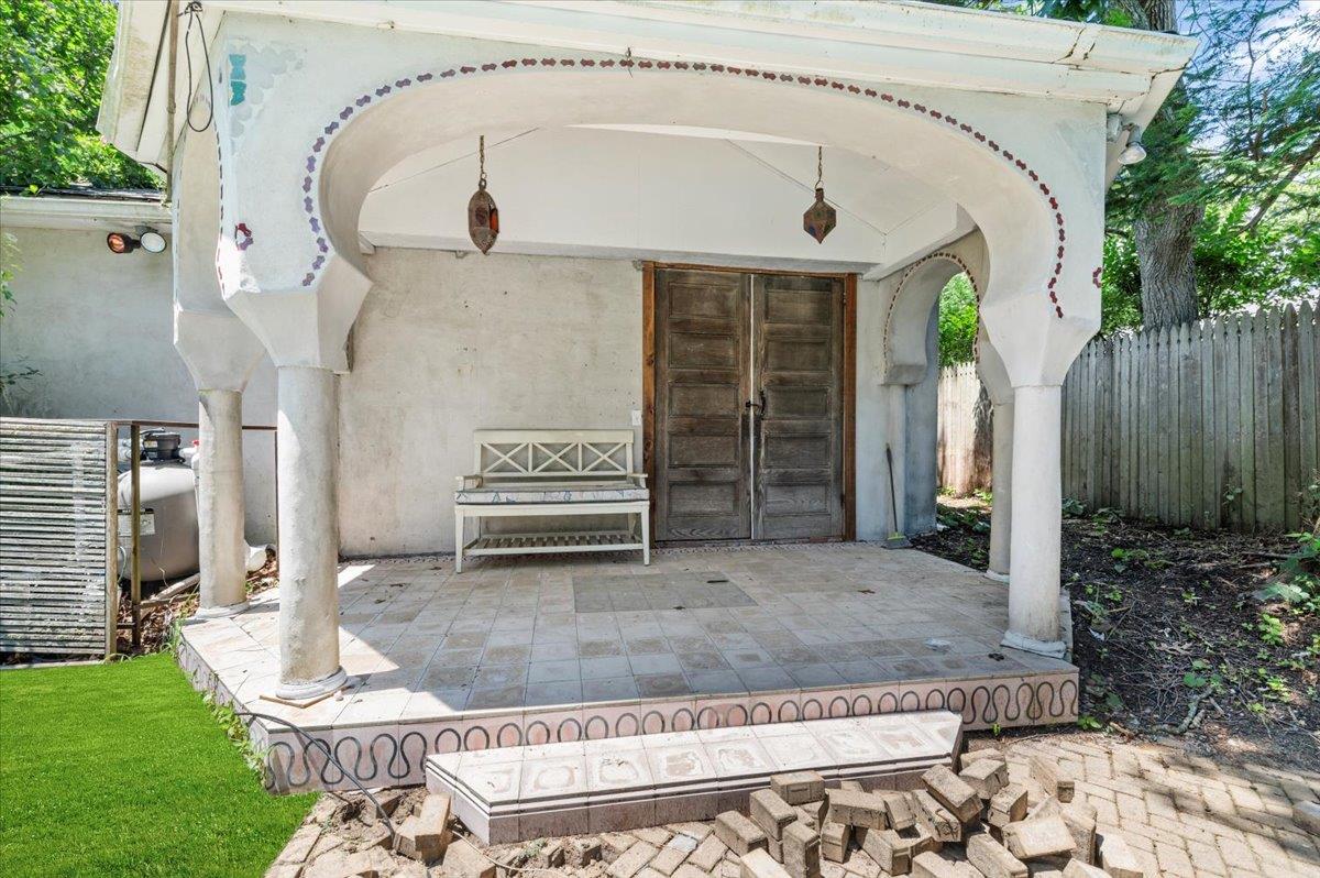 56 West Donellan Road Hampton Bays, NY 11946 - Photo 24 of 27 a front view of a house with garden