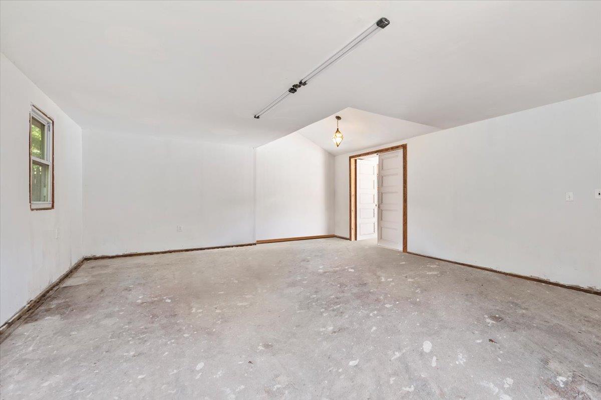 56 West Donellan Road Hampton Bays, NY 11946 - Photo 26 of 27 a view of an empty room with a window