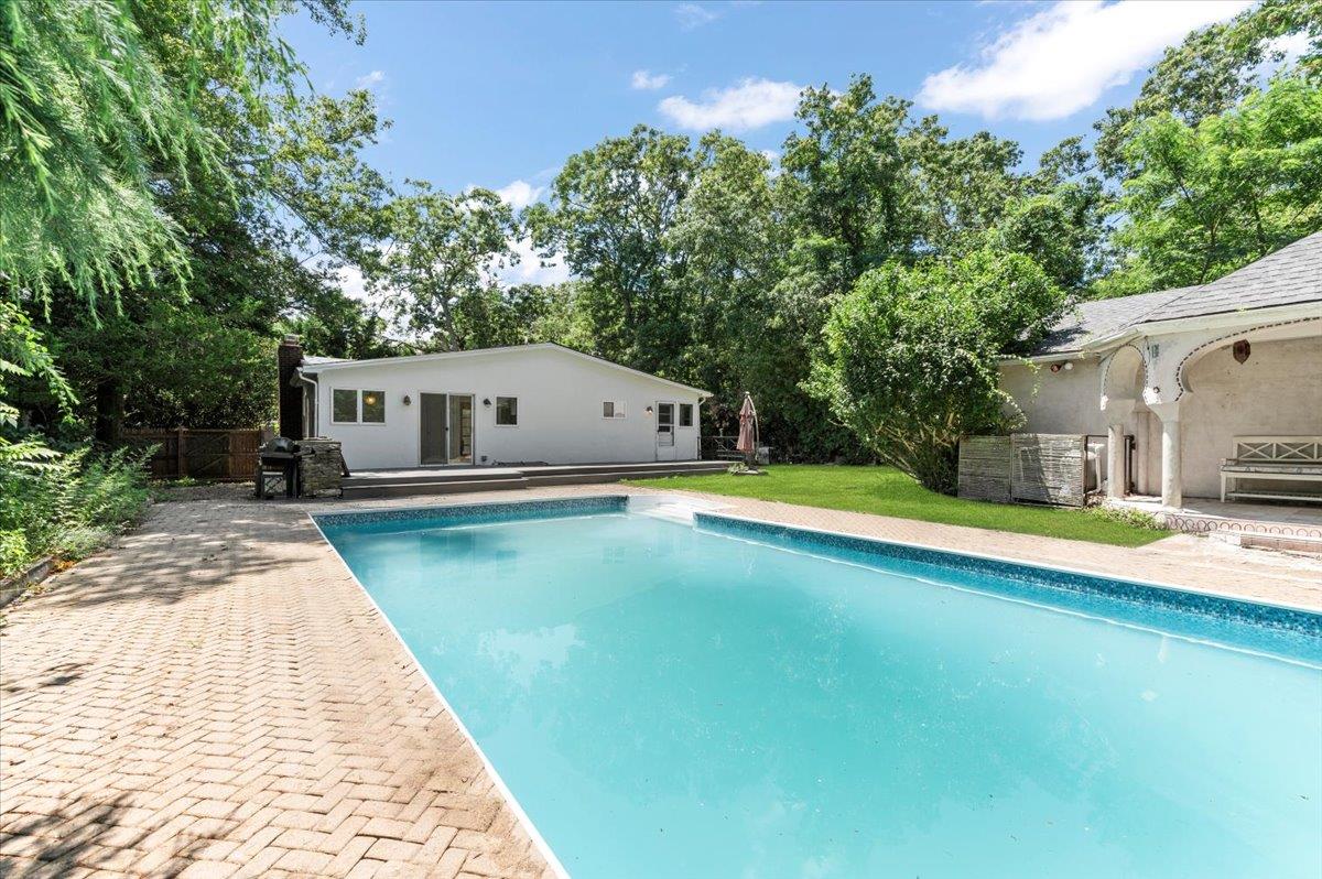 56 West Donellan Road Hampton Bays, NY 11946 - Photo 4 of 27 a view of swimming pool with lounge chair