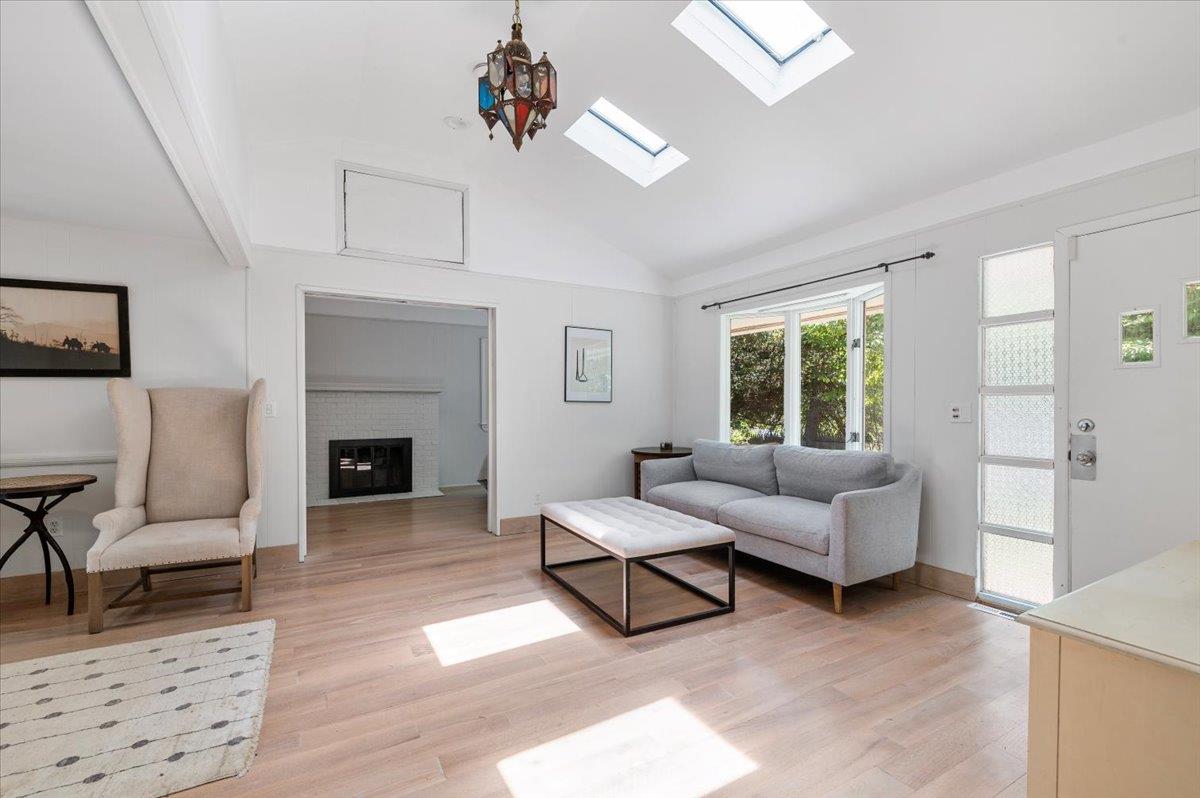 56 West Donellan Road Hampton Bays, NY 11946 - Photo 6 of 27 a living room with furniture and a fireplace