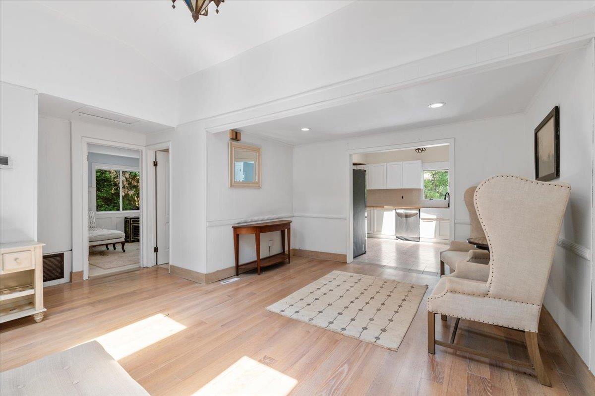 56 West Donellan Road Hampton Bays, NY 11946 - Photo 7 of 27 a living room with furniture and a table