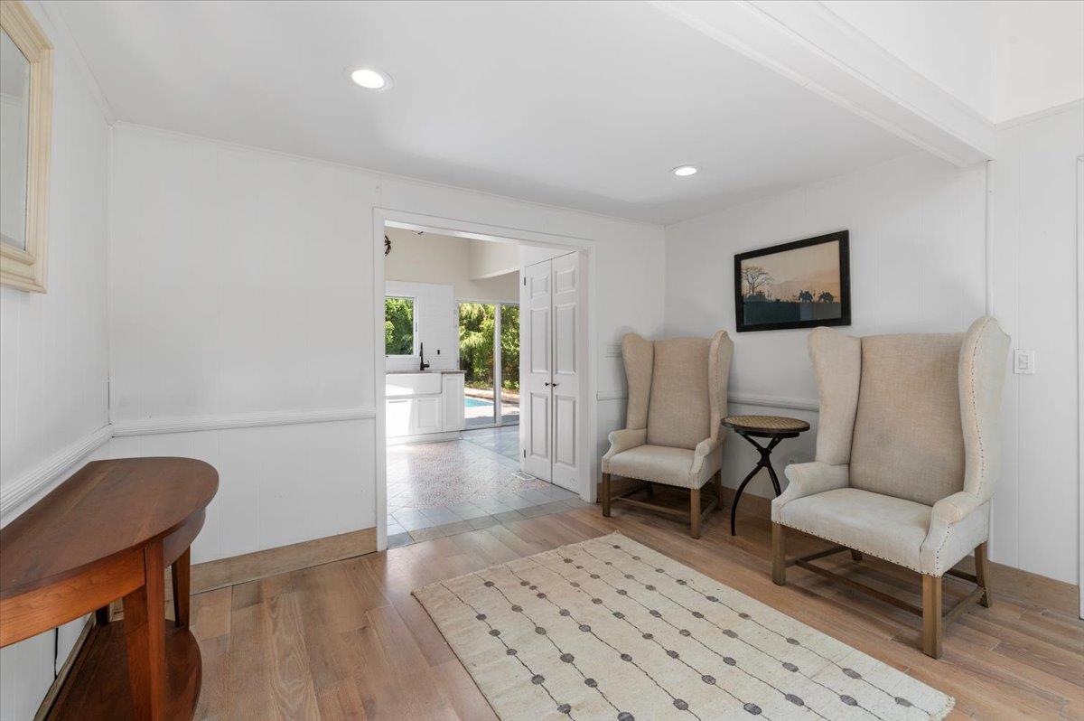 56 West Donellan Road Hampton Bays, NY 11946 - Photo 10 of 27 a living room with furniture and a rug