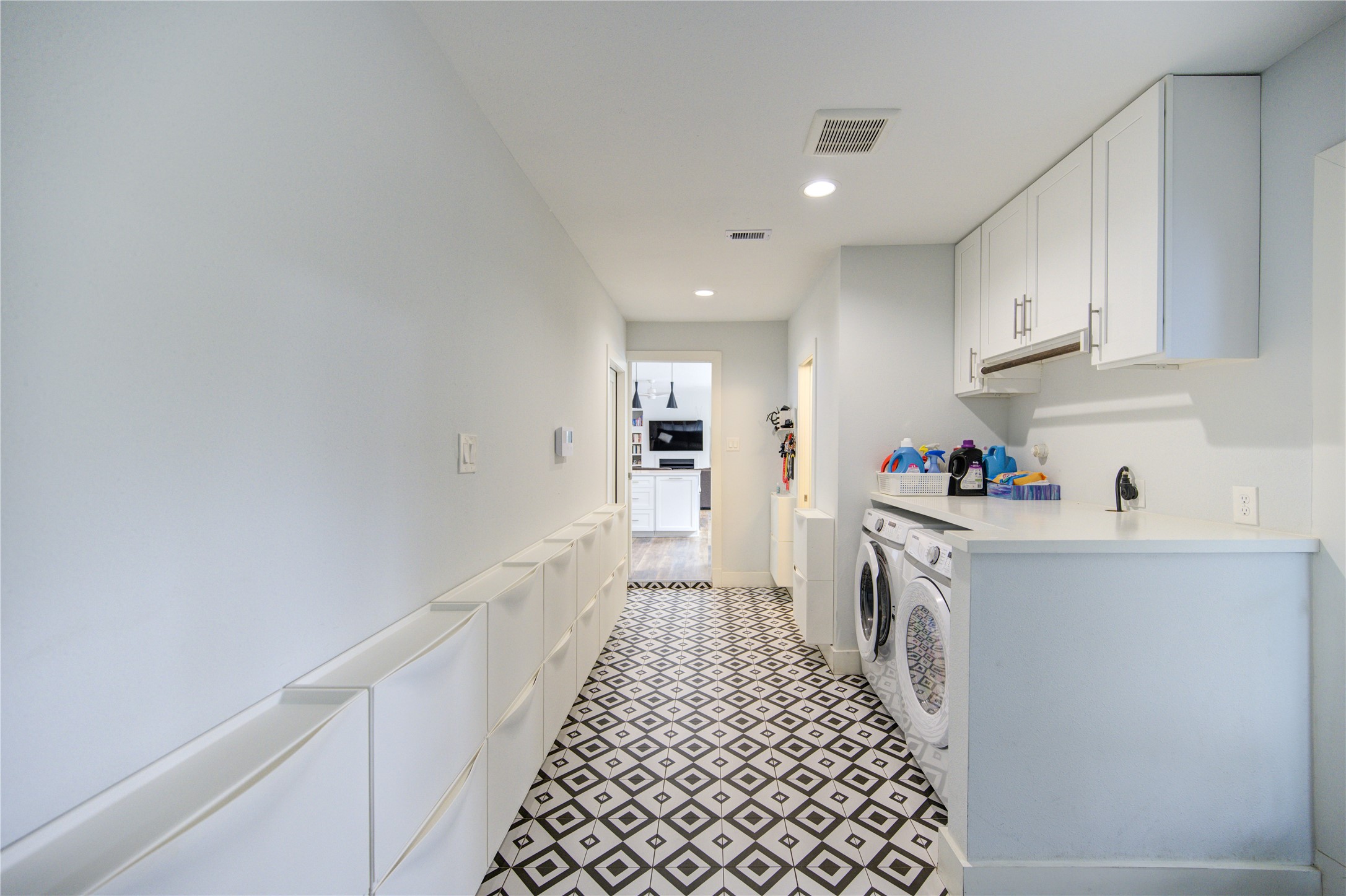 1215 Bethlehem Street Houston, TX 77018 - Photo 12 of 42 a kitchen with granite countertop white cabinets and white appliances